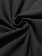 Close-up of black fabric showcasing the soft texture ideal for the Anti-Dillpressants Pickleball Tee.
