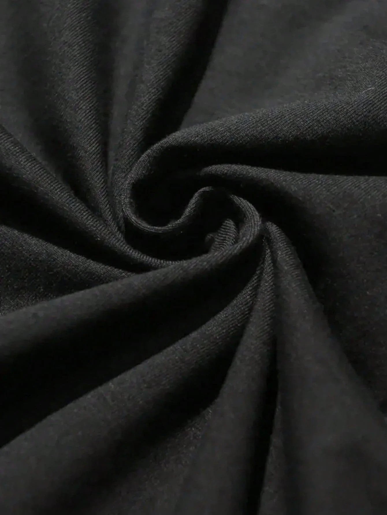 Close-up of black fabric showcasing the soft texture ideal for the Anti-Dillpressants Pickleball Tee.